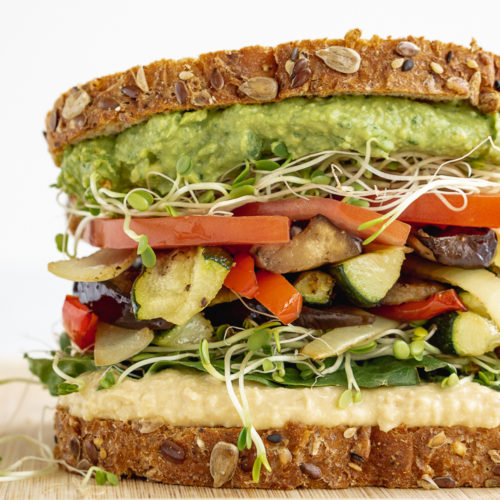 Roasted veggie sandwich with white background