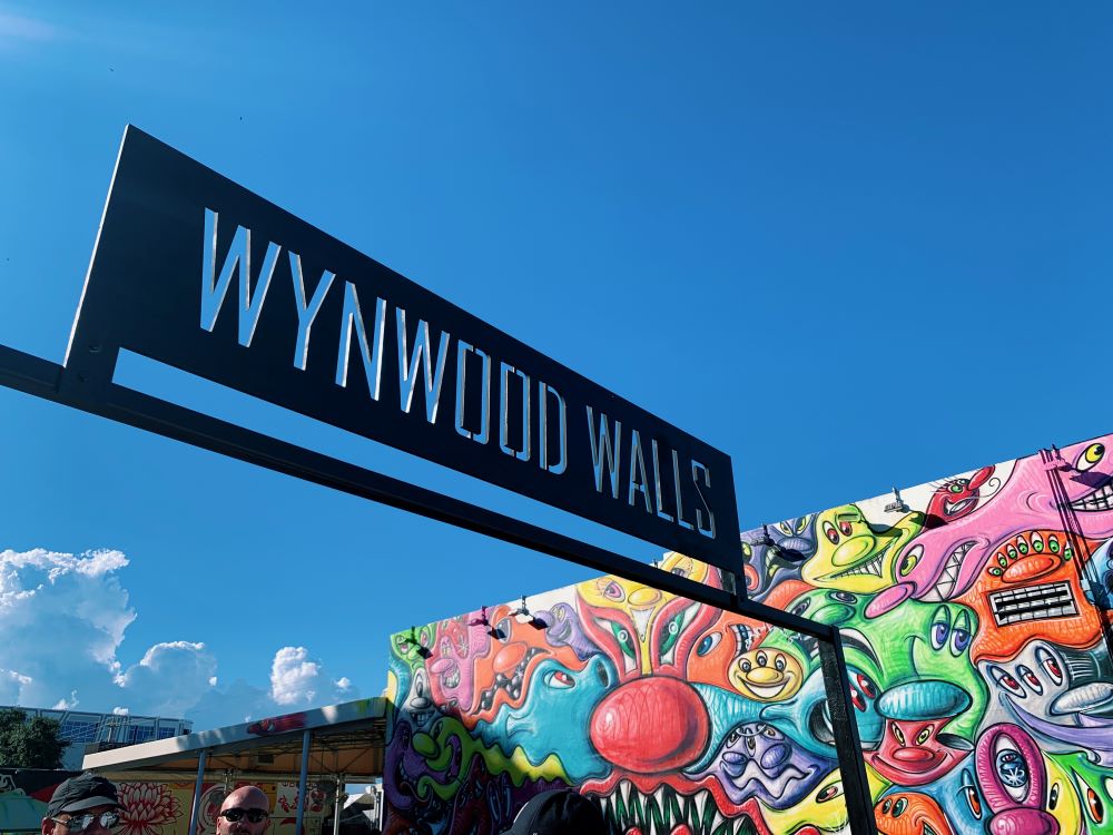Wynwood sign with graffiti in the background