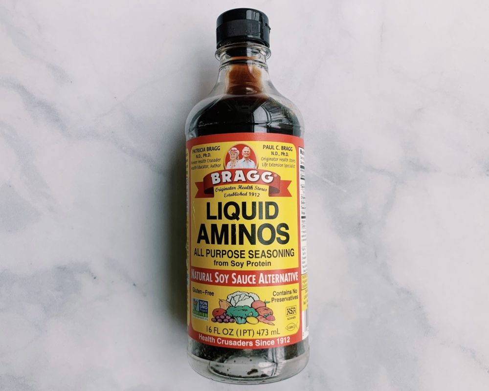 Liquid Aminos bottle on a counter
